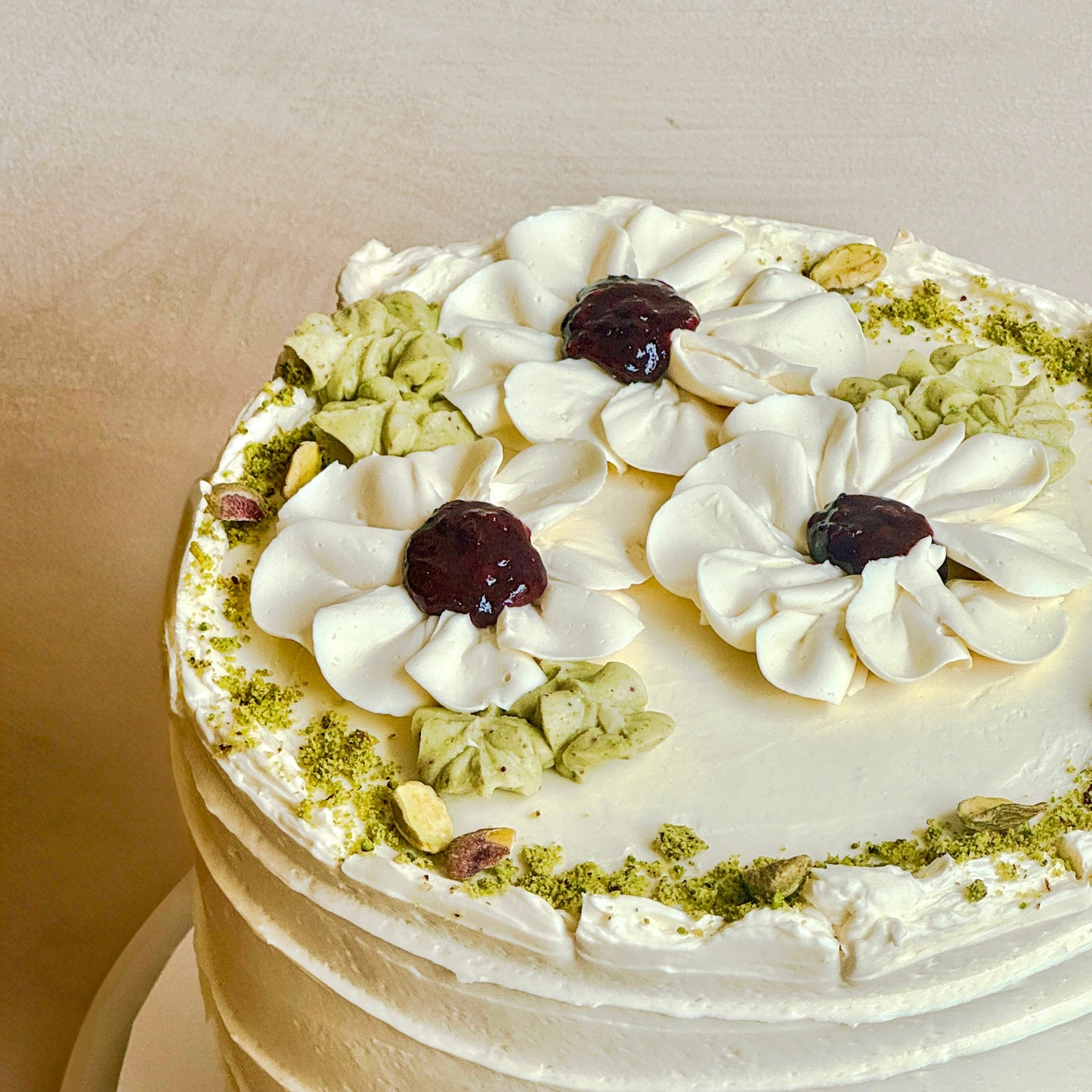 Pink Peppercorn Chiffon Cake with Pistachio Mousse, Sumac-roasted Blackberries & Honeycomb Cream