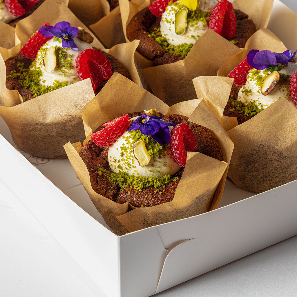 Pistachio, Rose & Cardamom Cupcakes with Raspberry Compote & Rose Buttercream