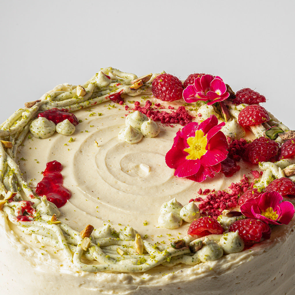 Pistachio, Rose & Cardamom Cake With Hibiscus Curd, Raspberry Compote & Rose Buttercream