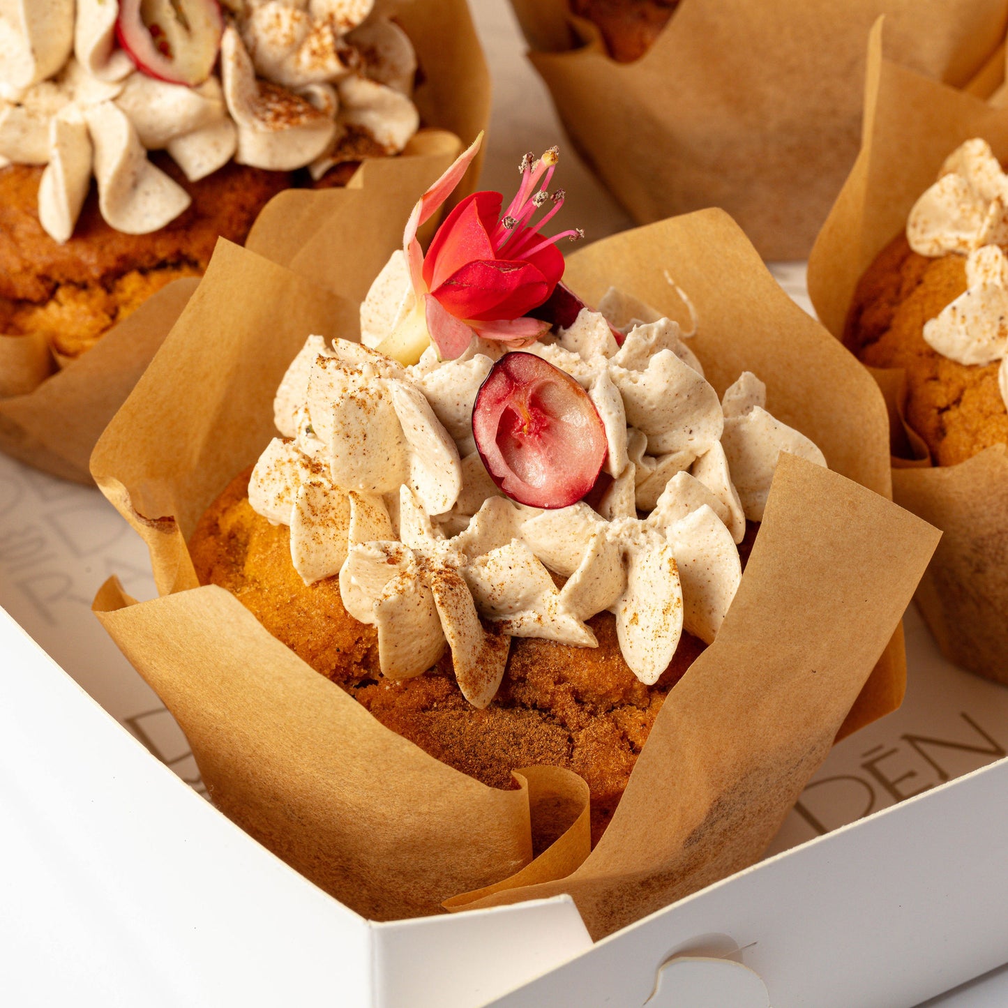 Pumpkin Cupcakes with Orange Cranberry Compote & Chai Cream