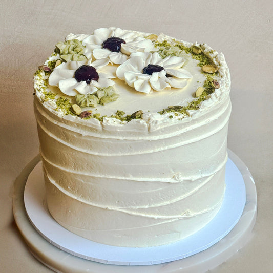 Pink Peppercorn Chiffon Cake with Pistachio Mousse, Sumac-roasted Blackberries & Honeycomb Cream