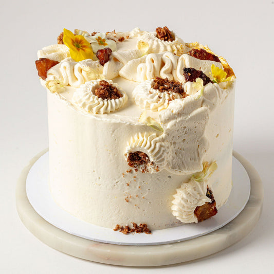 Carrot Cake with Roasted Pineapples, Candied Walnuts & Cream Cheese Buttercream