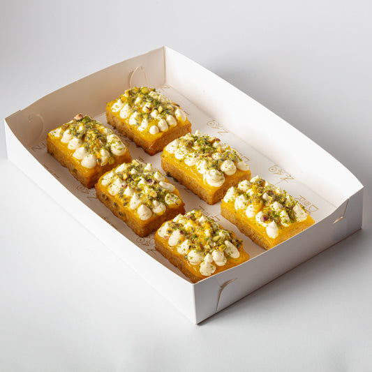 Orange Rosemary Basbousa with Mango, Passionfruit & Mastic Cream