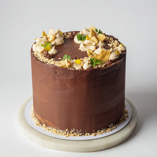 Chocolate Cake with Salted Tahini, Glazed Bananas, Salted Caramel & Dark Chocolate Ganache
