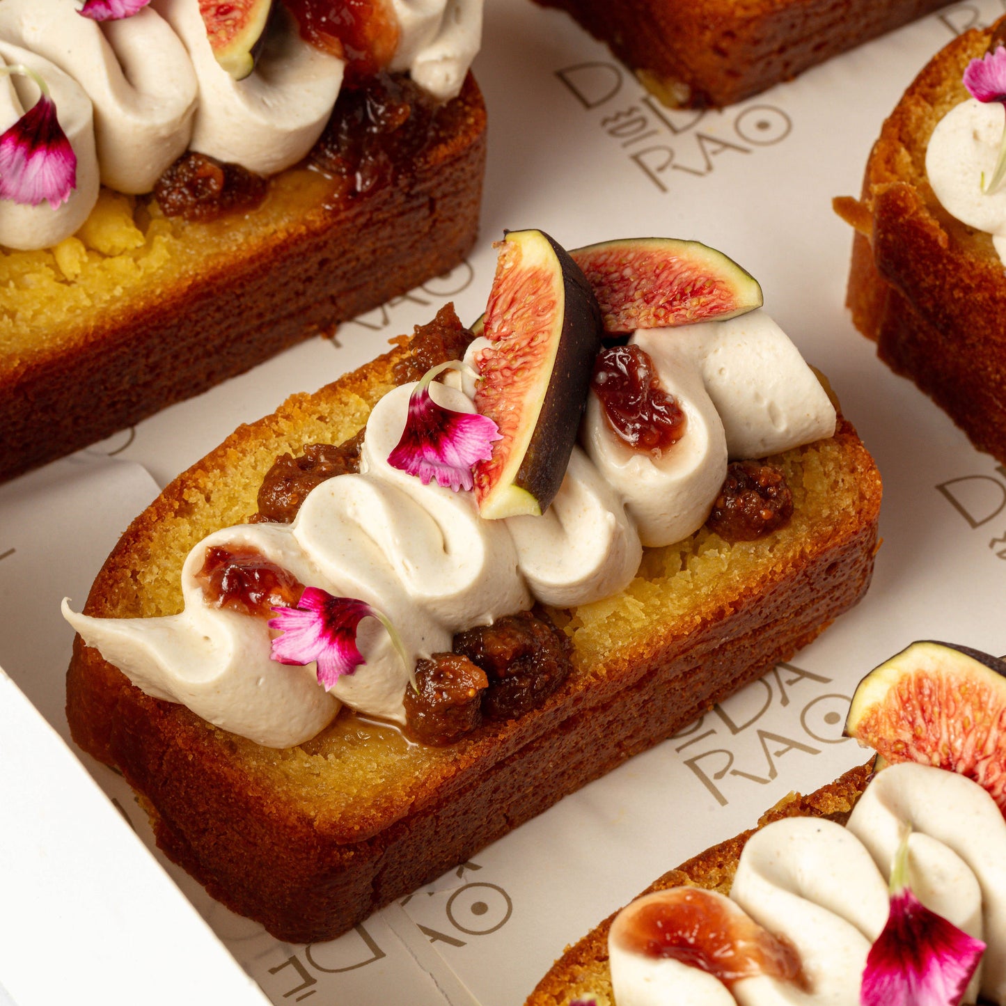 Victoria Sponge Cake, Fig Compote, White Chocolate Ganache, Rose Jam & Fresh Figs